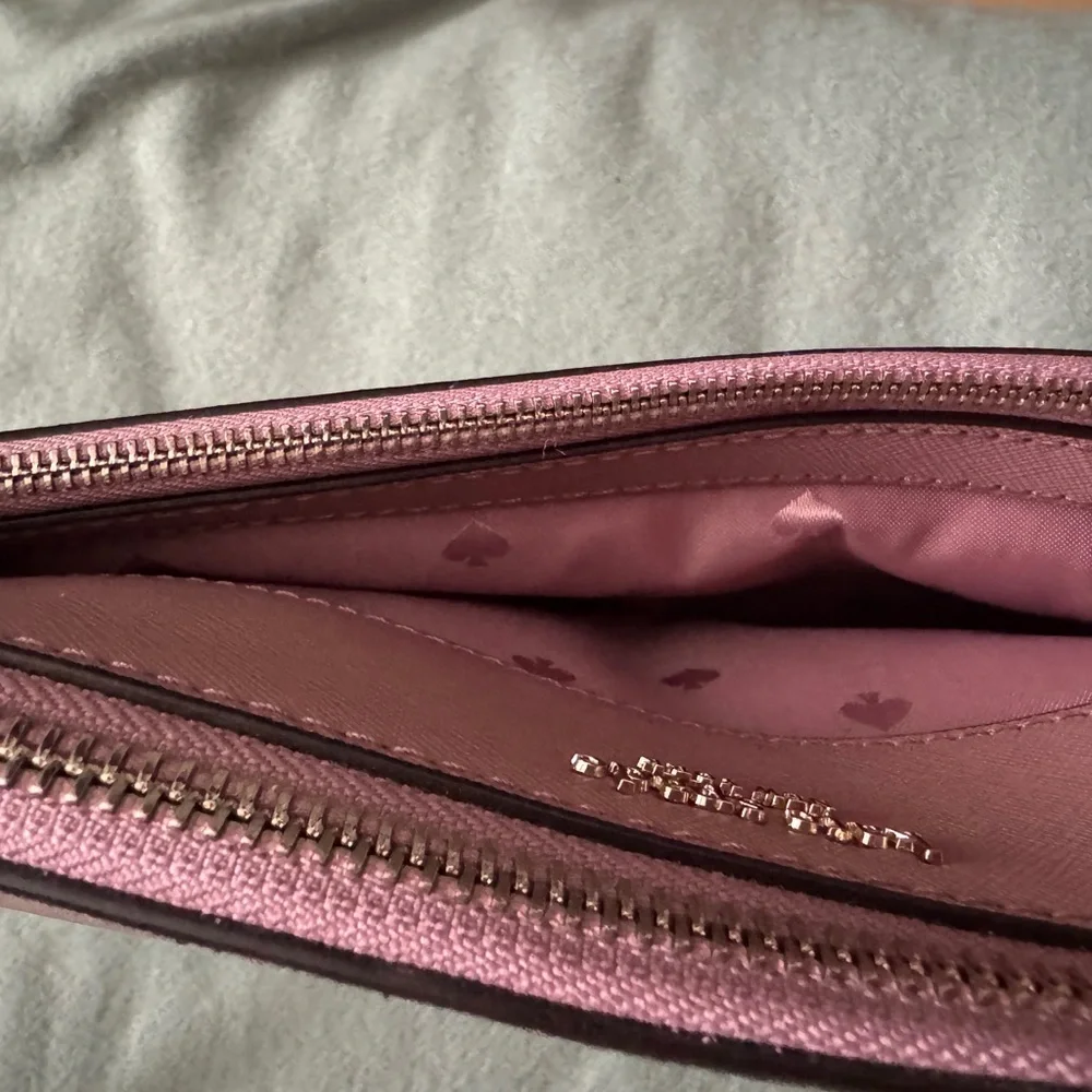 Mauve Kate Spade cross body bag